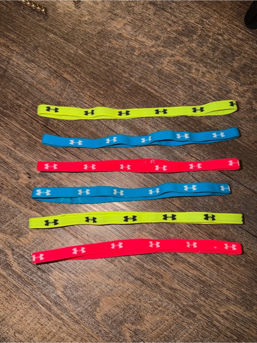 Under Armour Kids Stretch Headbands in Neon Yellow, Blue, and Hot Pink